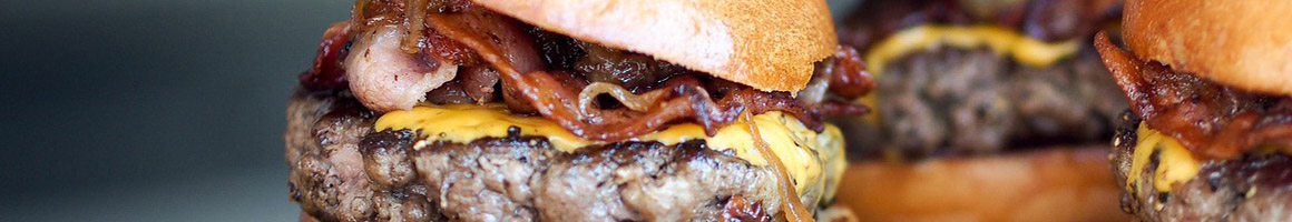 Eating Burger at Bonus Burger restaurant in Lubbock, TX.